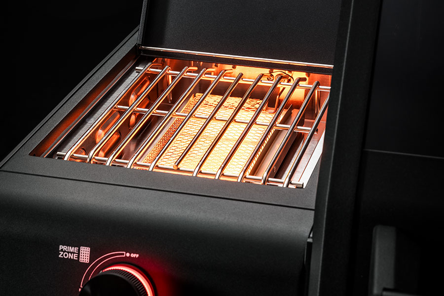 Primezone Heated prime zone in the side table of an Allflame barbecue
